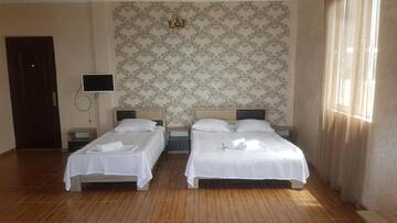Улучшенный трехместный номер с видом на море в Отеле Hotel Kvariati Nugo